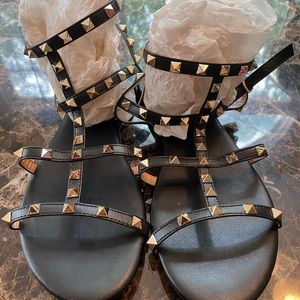 Black flat gladiator style sandals